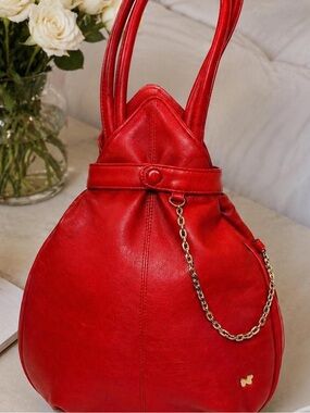 Nina Ricci red leather handbag